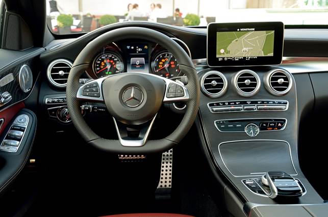 The Mercedes' interior is elegantly styled