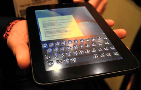The company showcases a tablet with this technology where a proper tactile keyboard emerges from BENEATH the screen