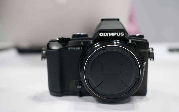 Olympus today is announcing their new Stylus 1 camera–a small sensor camera with OMD EM5 styling but with a small sensor and a fixed f2.8 long zoom