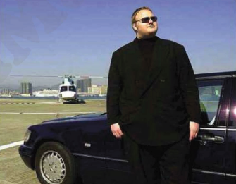Description: Kim Dotcom, attempting to camouflage himself as an expensive car. This didn’t work, and he’s due to be extradited to the US from New Zealand. But does this stop other people sharing copyright-protected content?