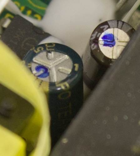 A single Teapo capacitor next to the standby source chip