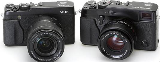 This is the X-E1 with its 18-55mm kit zoom, along with its big brother the X-Pro1 equipped with the nice F1.4 R XF 35mm lens. The X-E1 is much smaller because of removing the optical viewfinder, but the similarity of the two camera series is generally outstanding.