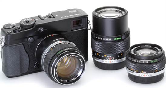 The X-Pro1 (X-E1 compatibility is identical) with three Olympus OM Zuiko lenses from the 1970s that are still easy to find all, from right to left, 50mm F1.4, 135mm F3.5 and 24mm F2 .8