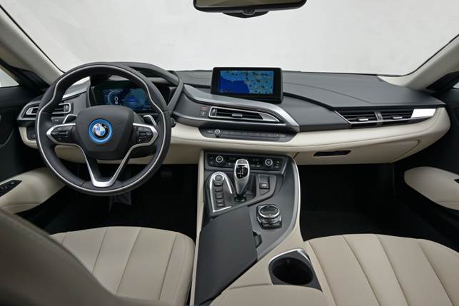 The i8 features a premium-looking leather-trimmed interior