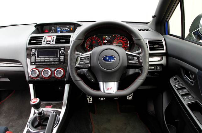 Cabin detailing is racy, but taller owners will find the driver's seat doesn't drop low enough