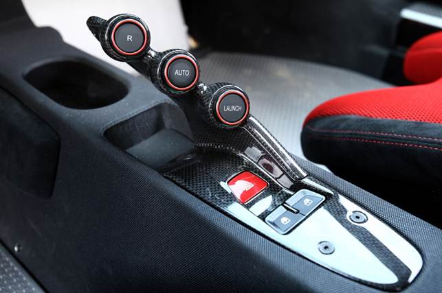 Central stalk inspired by LaFerrari supercar. The key button is marked simply ‘Launch’. Apollo rockets had something similar