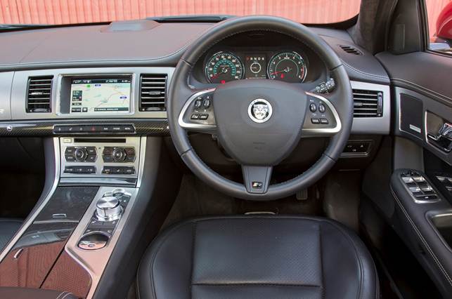 The interior is both elegant and well-built. A rotary dial replaces the old stick shifter