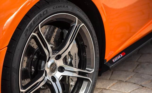 The 650S is equipped carbon-ceramic brakes standard, stiffening the springs 22 percent in front and 37 in back, and mounting forged 19-inch-front and 20-inch-rear wheels wrapped in Pirelli P Zero Corsa rubber