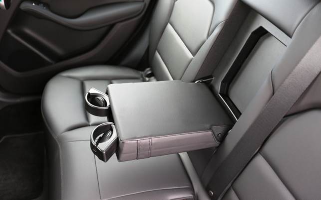 The rear seats get cup holders while the front get electric controls and a memory function