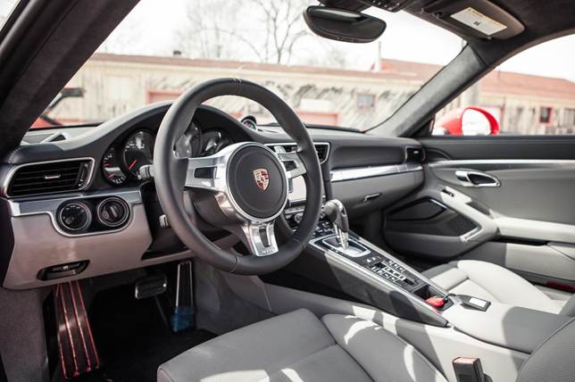 Once ensconced in the Targa's interior, you feel secure and only partially exposed to the elements