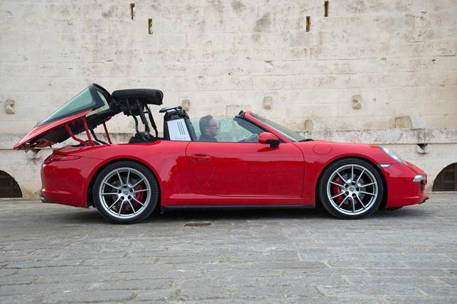 While the original Targa's roof panel had to be removed manually, the latest version can be operated at the press of a button