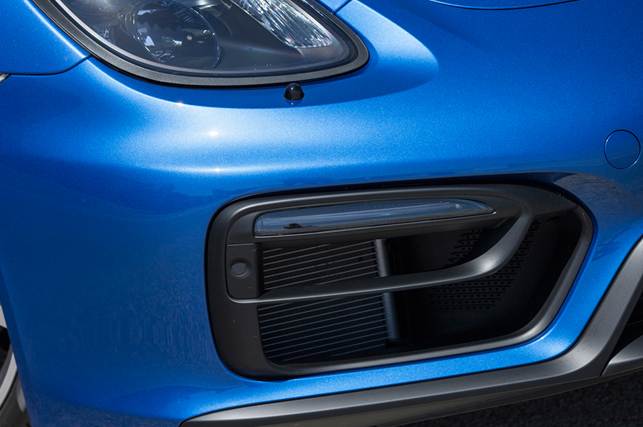 ‘Grab-handle’ front air intakes differentiate GTS from standard Boxster. Not the most elegant
