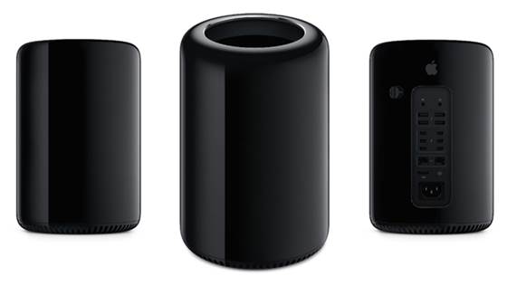 The Mac Pro is cylindrical and a dark, dark grey or black. In volume it’s one-eighth smaller than previously. The real beauty of this is its spinning base