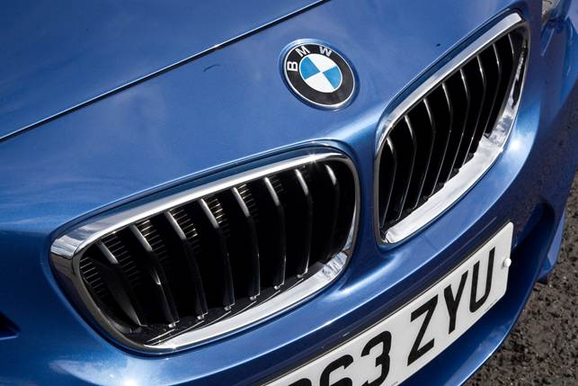 M235i's kidney grille has 16 vertical bars and leans forward very slightly as it rises, shark-nose style