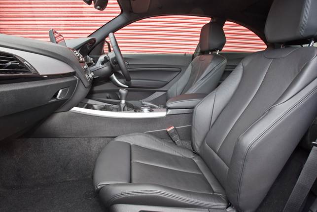 Driver's seat is both widely adjustable and comfortable, if a bit high-set for a coupe