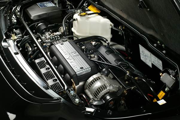 Underneath the vented hood, HART had already pushed aside the NSX's 3.0L C-Series engine.