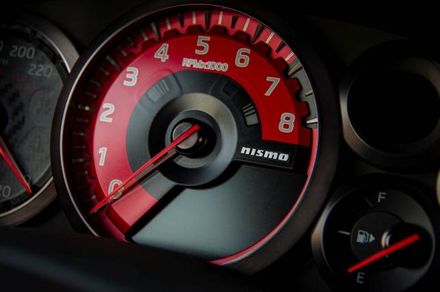 Red touches continue inside, with Nismo-branded rev-counter