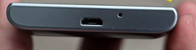 Description: MicroUSB port is located on the bottom edge.