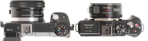 Description: Both cameras have a mode dial and a standard accessory hotshoe.