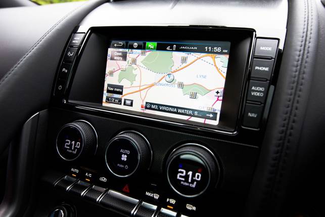 The convertible's multimedia system remains; it functions well enough but feels outdated