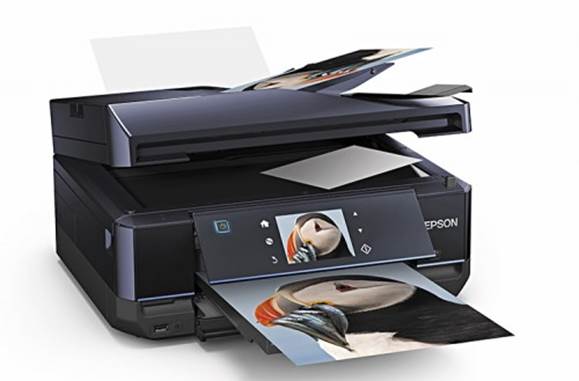 The unit even has a caddy for printing on specially coated CD and DVD media, though the software and documentation can be confusing.